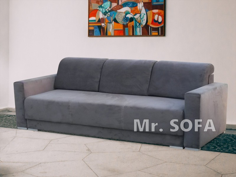 nowoczesna kanapa z poduszkami nakładanymi na oparcie